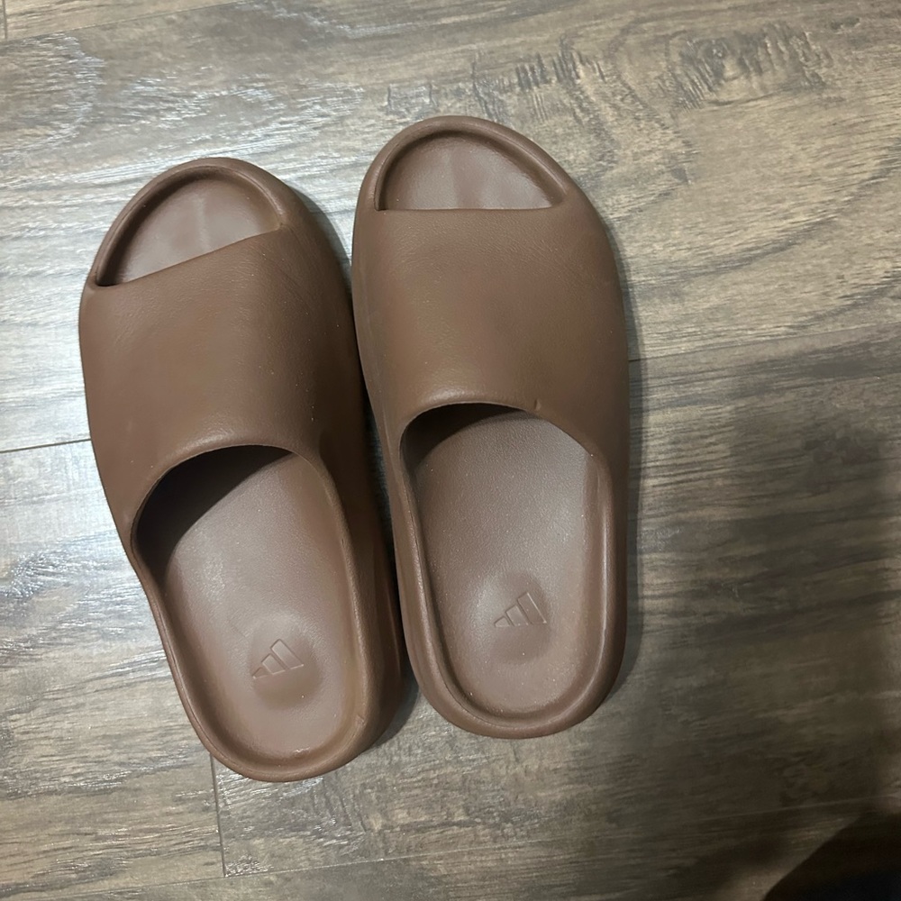 YEEZY Slides. Fit like a women’s 7